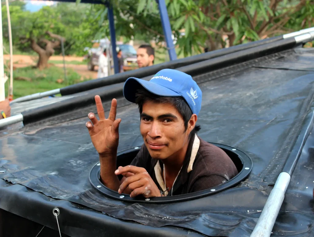 Ha ta Tukari. Lupe, part of the Wixárika Intercultural Team building an Atlali Cistern.